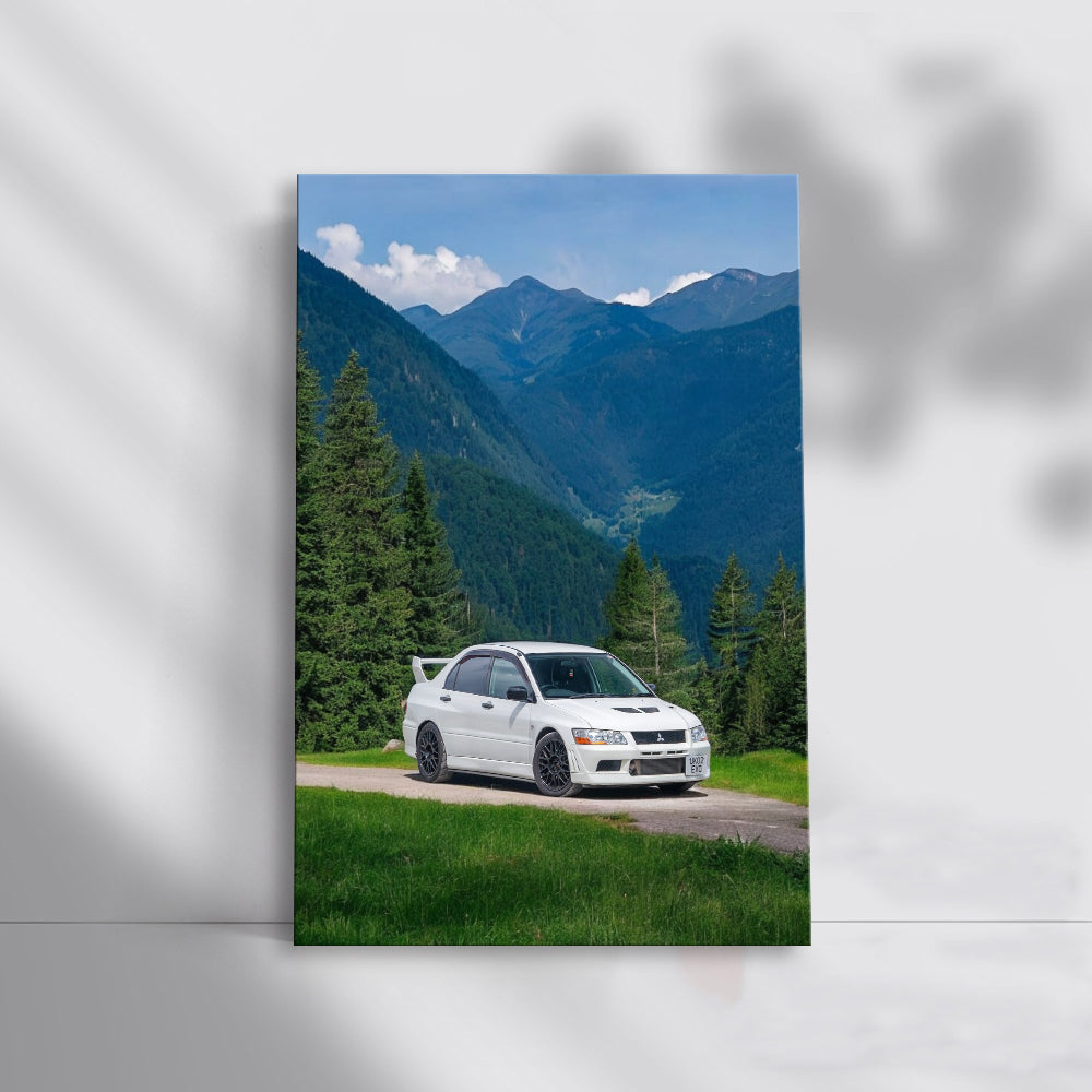 White Mitsubishi Lancer Driving Through Majestic Mountains - Thrilling Adventure