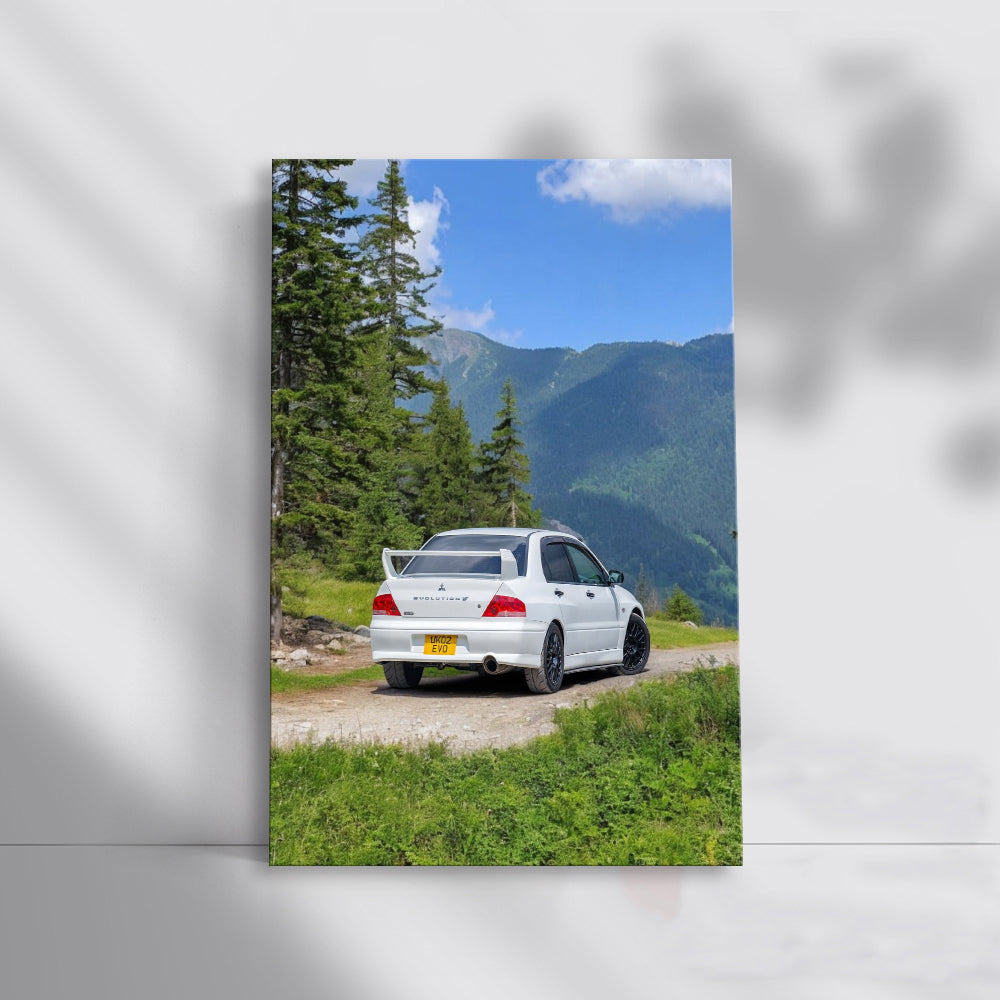 White Mitsubishi Lancer in Mountainous Terrain - Adventure Ready