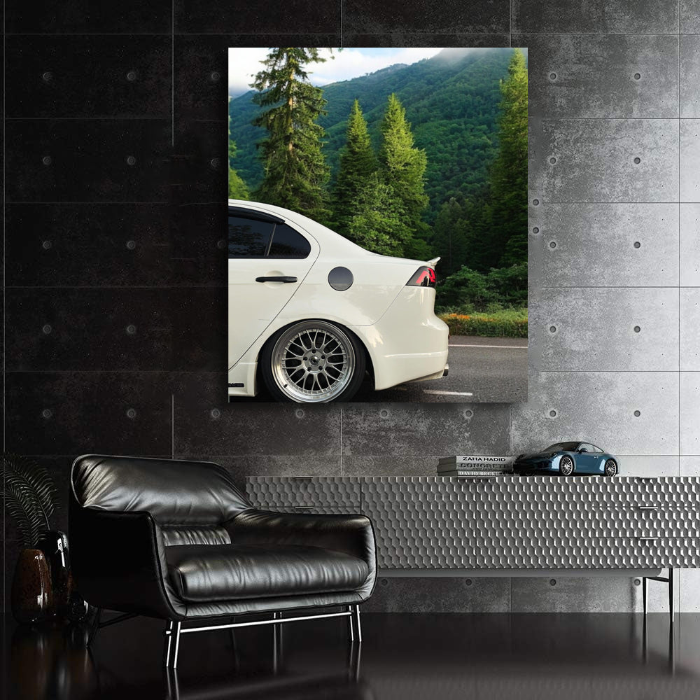 White Mitsubishi Lancer in Mountain Terrain - Adventure Awaits