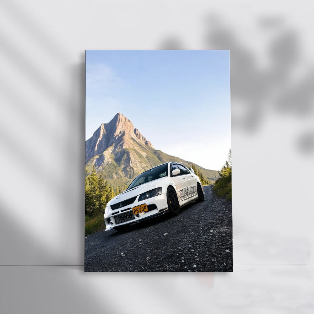 White Mitsubishi Lancer in Mountainous Terrain - Sporty Drive