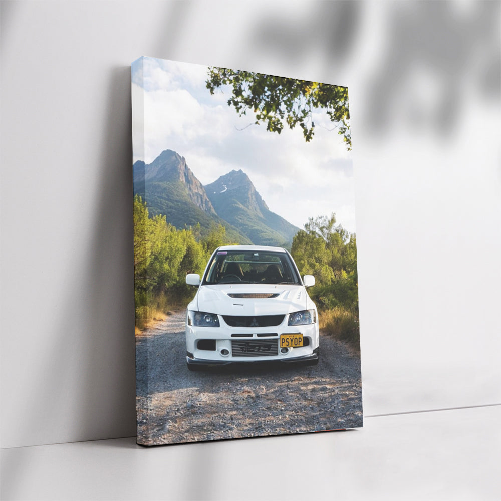 White Mitsubishi Lancer in Mountainous Terrain - Sporty Drive