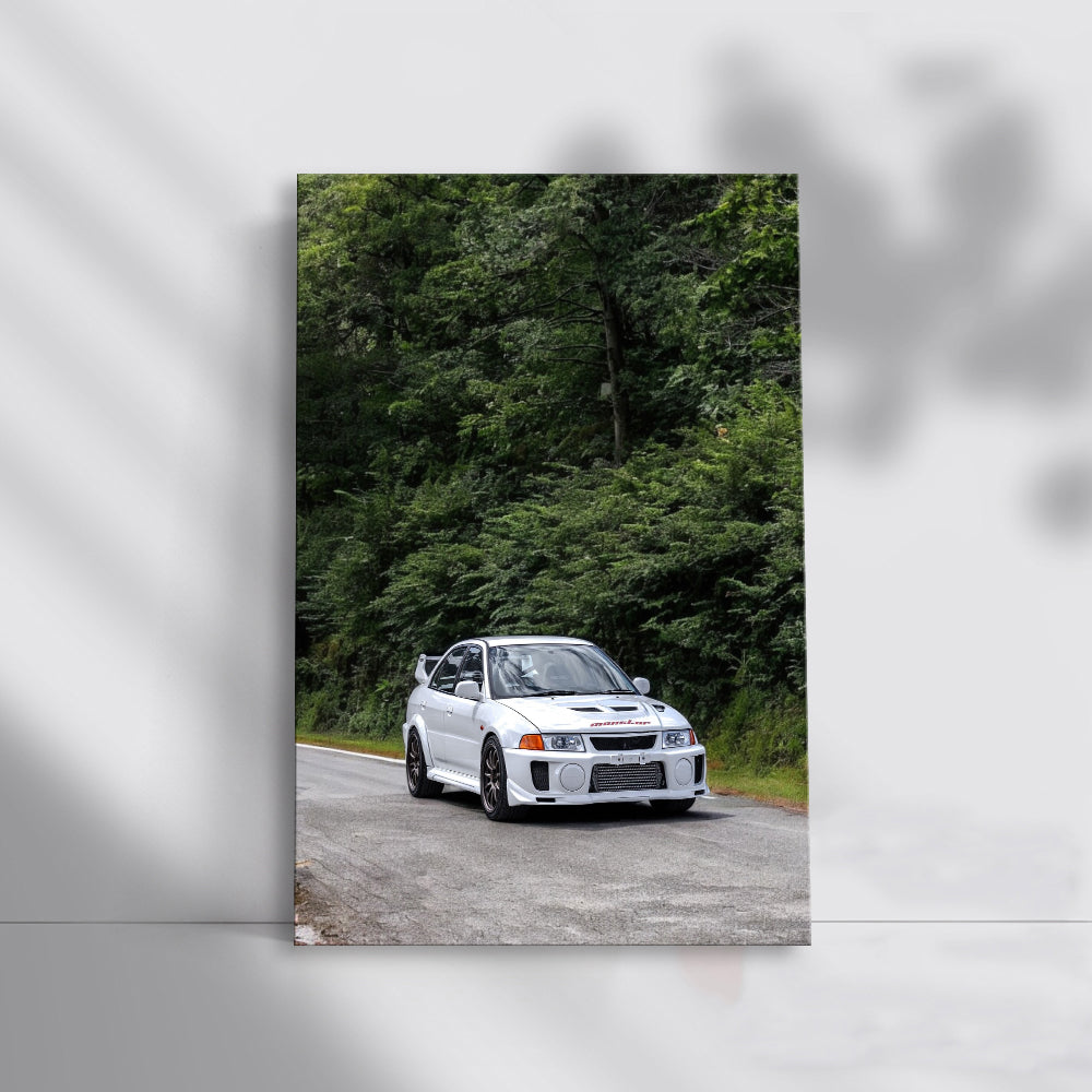 White Mitsubishi Lancer Cruising Road - Sleek and Stylish