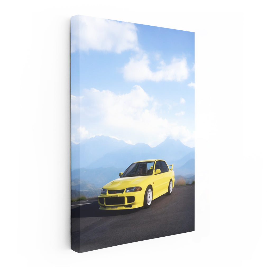 Yellow Mitsubishi Lancer in Mountainous Terrain - Sporty Drive