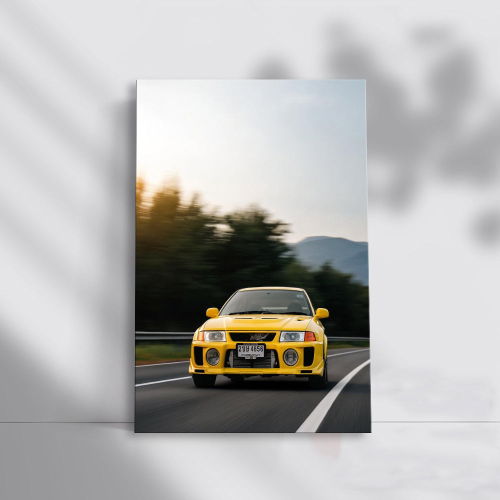 Yellow Mitsubishi Lancer on Scenic Mountain Road - Bold and Sporty