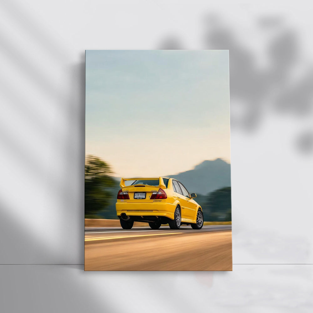 Yellow Mitsubishi Lancer Drives by Mountains - Sporty Style