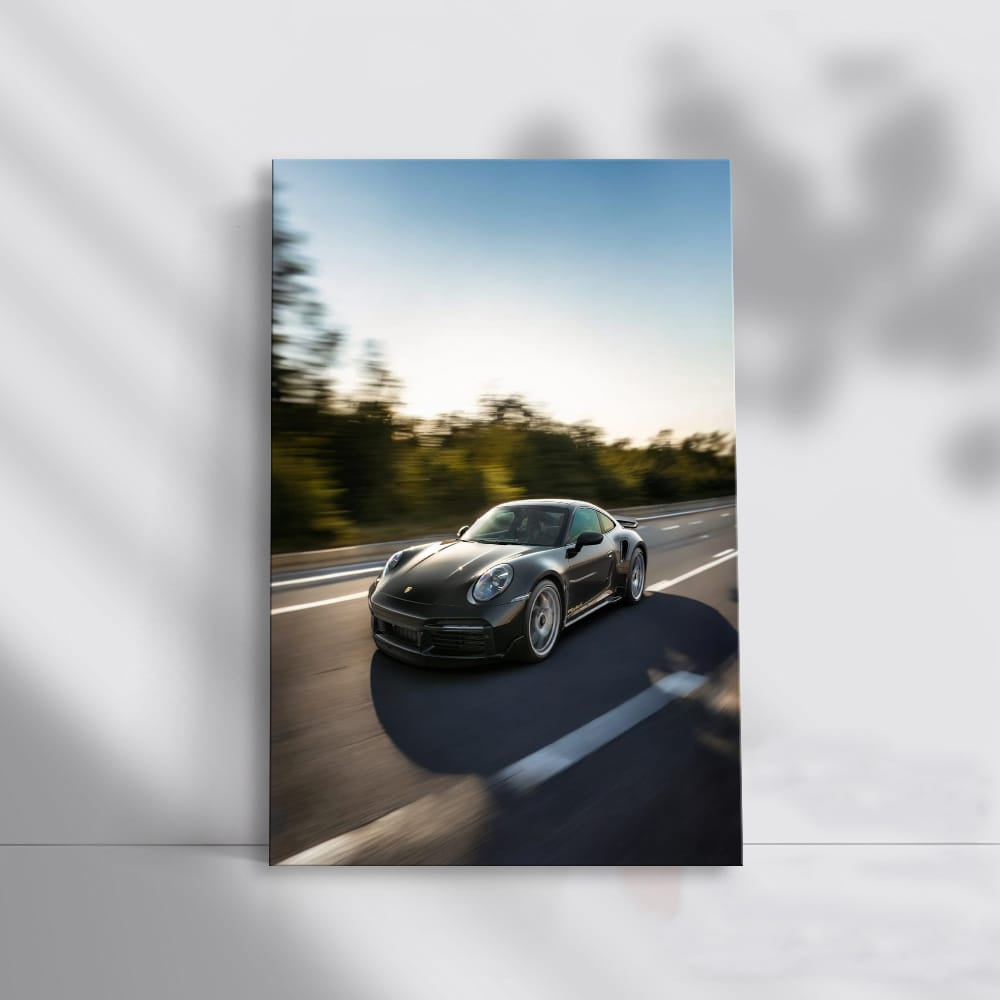 Black Porsche 911 Speedster Cruising - Sleek & Powerful Icon