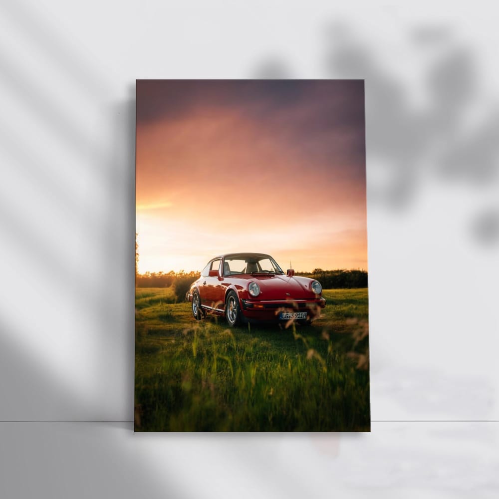 Classic Porsche 911 at Sunset in Field - Timeless Elegance