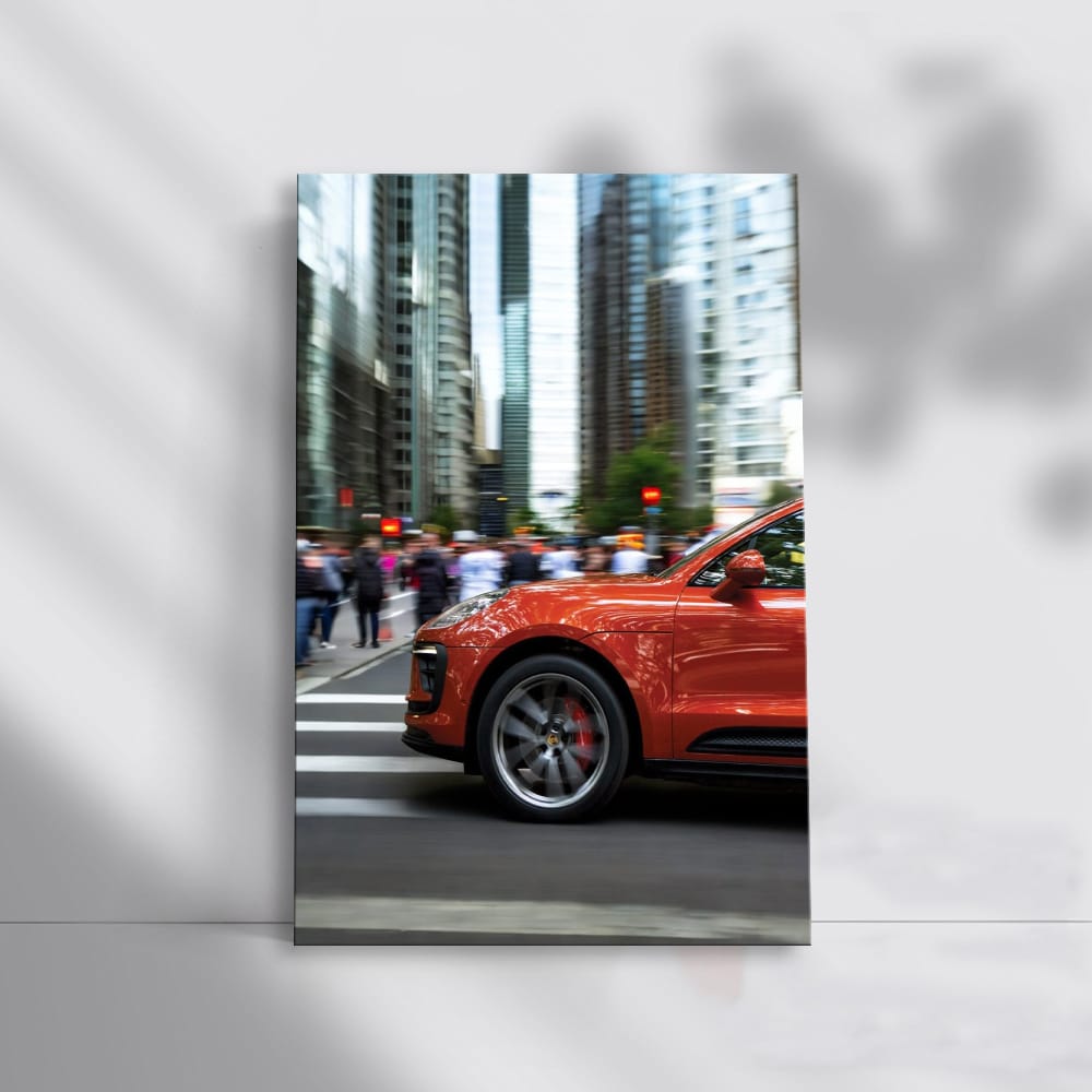 Vibrant Orange Porsche Macan S with Skyscrapers - Bold Elegance