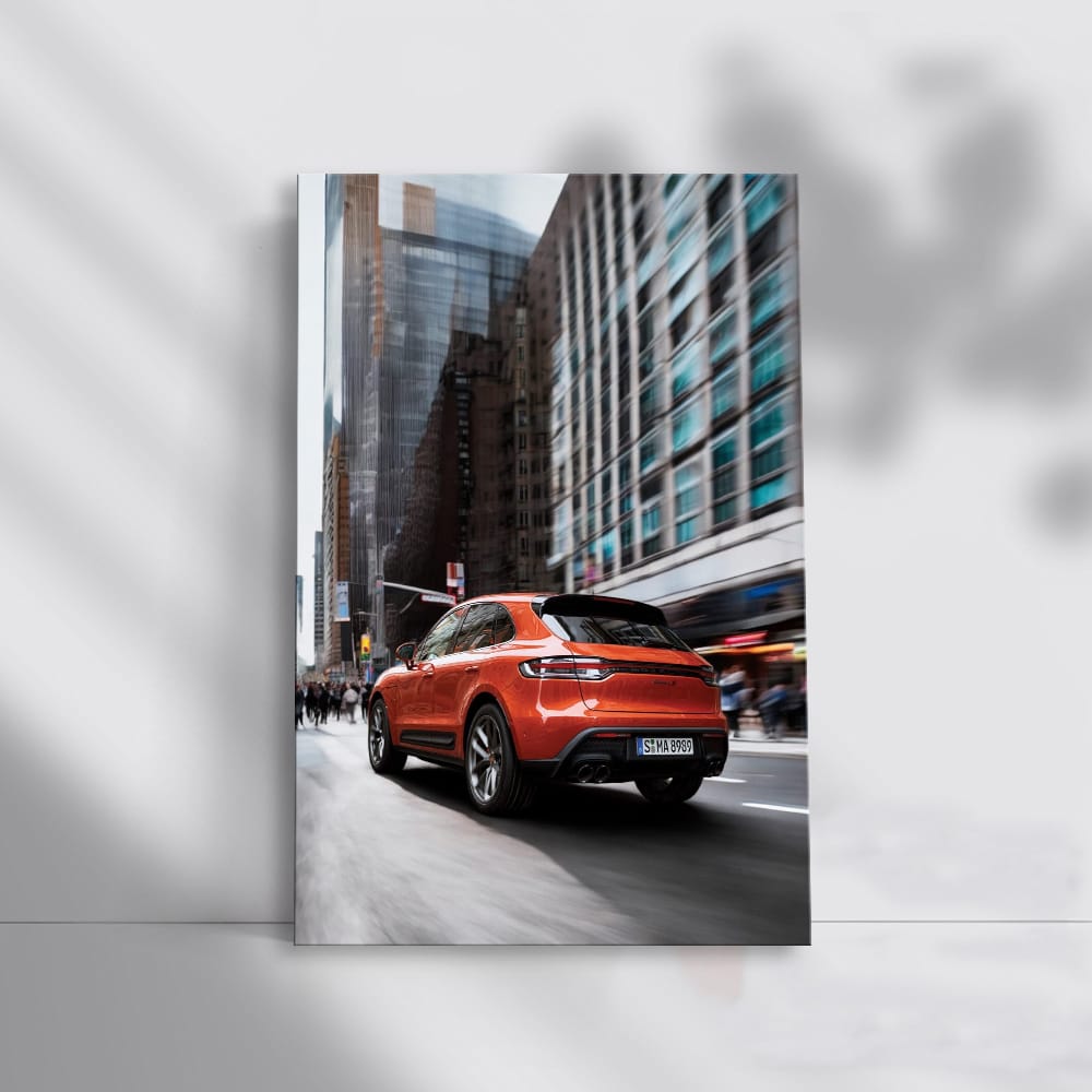 Porsche Macan S in Orange with Skyscraper Backdrop - Dynamic Power