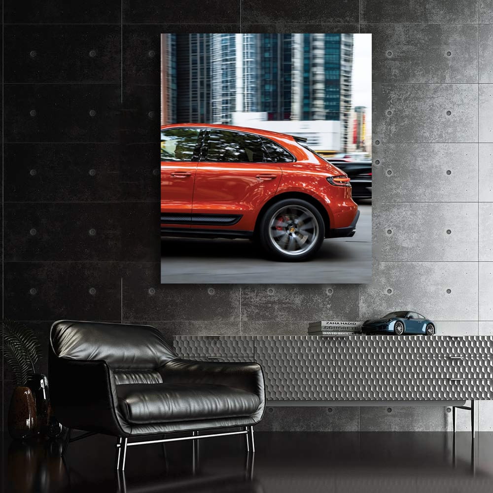Porsche Macan S in Orange Amidst Skyscrapers - Urban Elegance