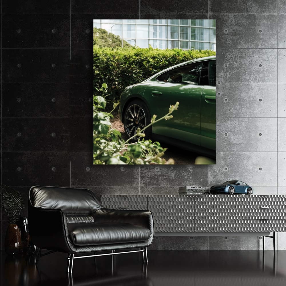 Sleek Green Porsche Parked by Glass Building - Style Meets Speed
