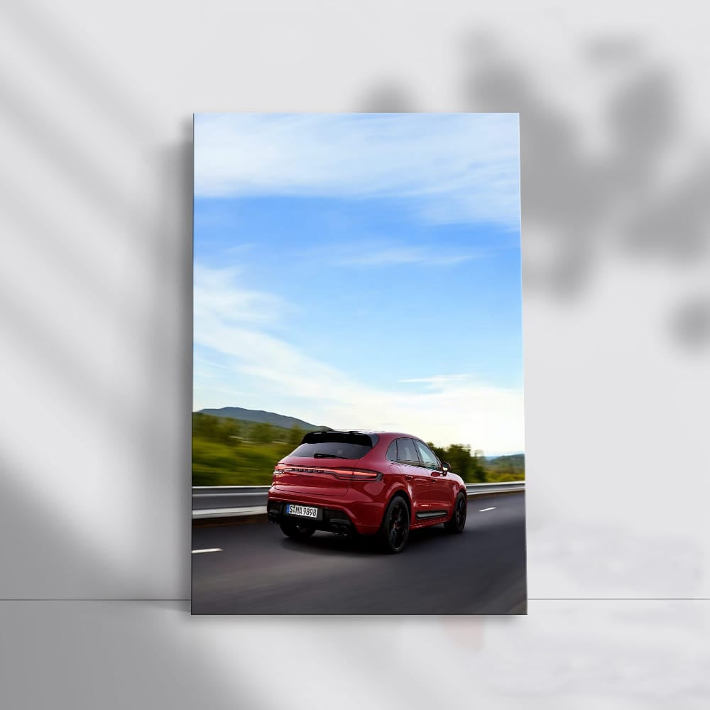 Red Porsche on Scenic Road - Sleek Performance Machine