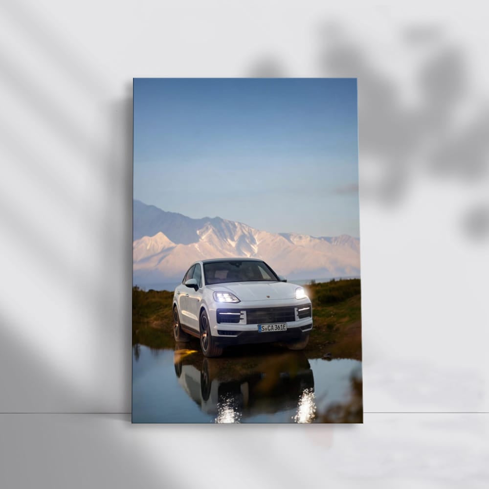 White Porsche Cayenne Coupe with Snowy Mountains - Power & Elegance