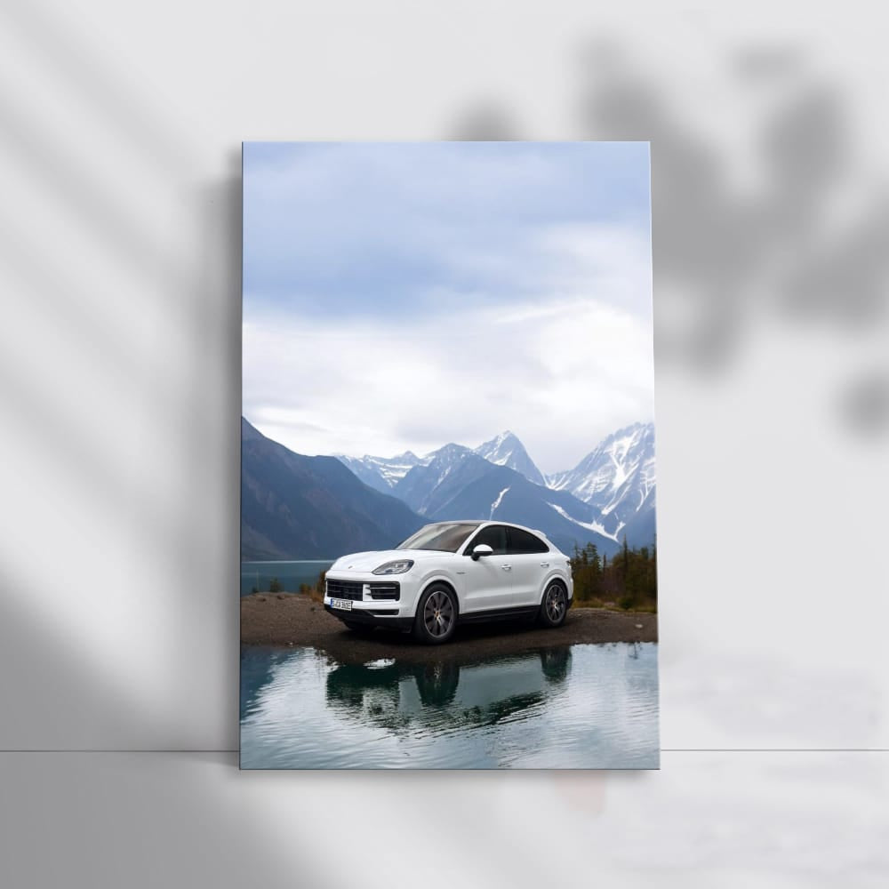 White Porsche Cayenne Coupe Amid Snowy Peaks - Power and Prestige