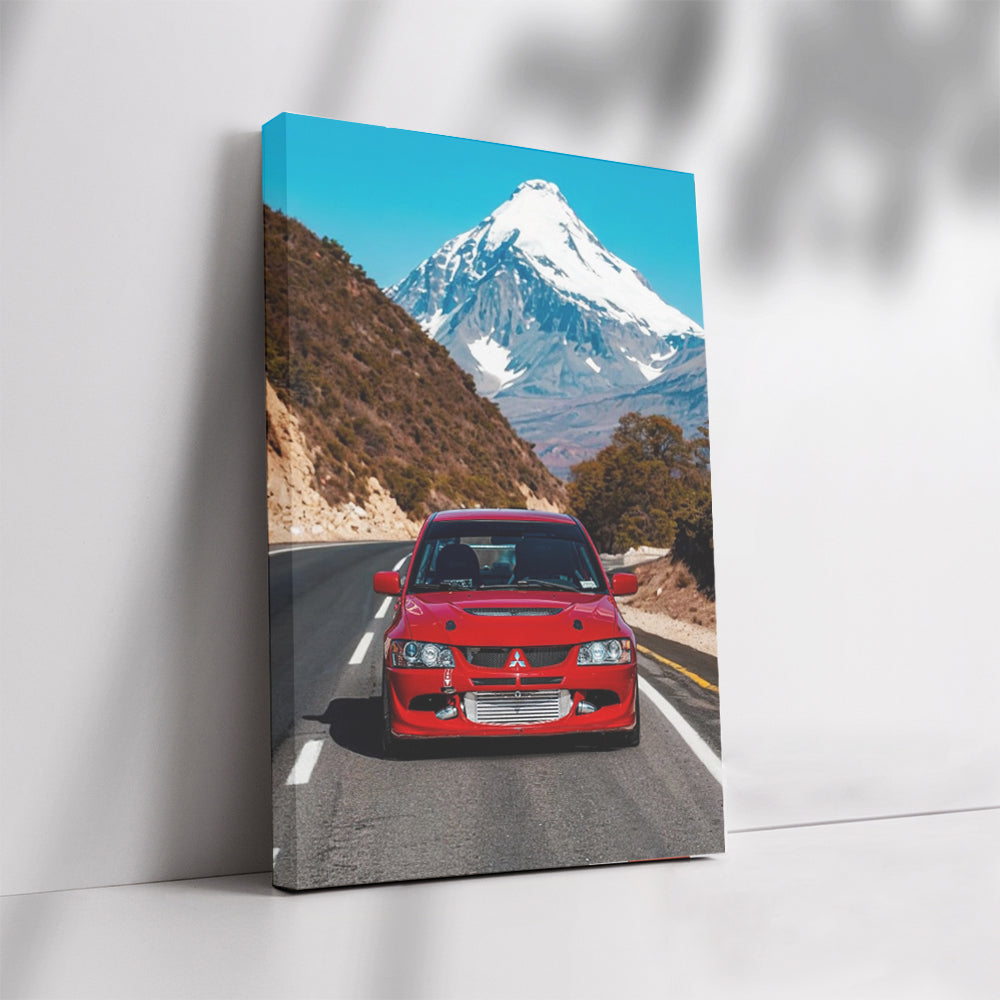 Red Mitsubishi Lancer Cruising by Snowy Peaks - Sporty Elegance