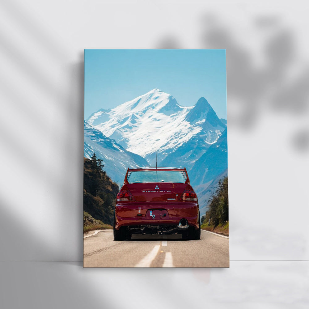 Red Mitsubishi Lancer on Road, Snowy Mountains Behind - Speedy Spirit
