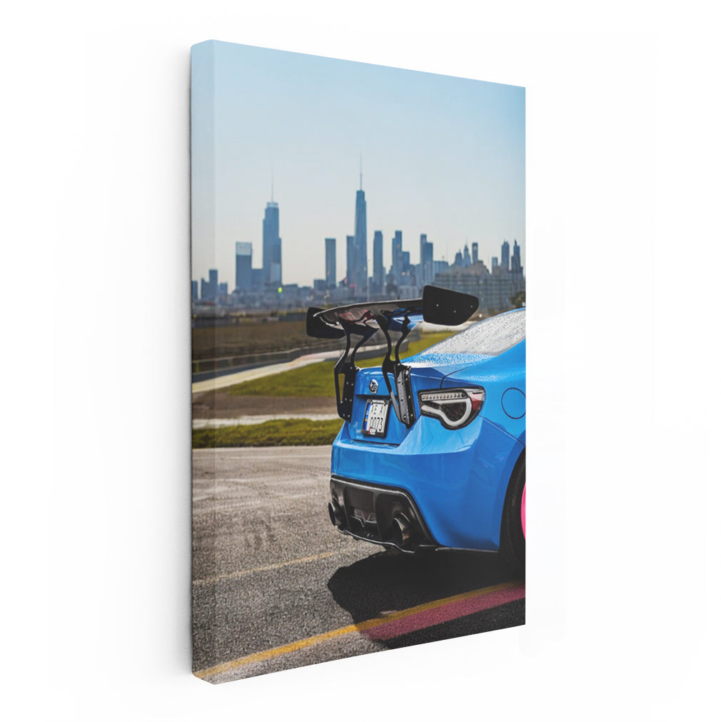 Subaru BRZ in Blue Cruises with Cityscape - Sleek Urban Ride