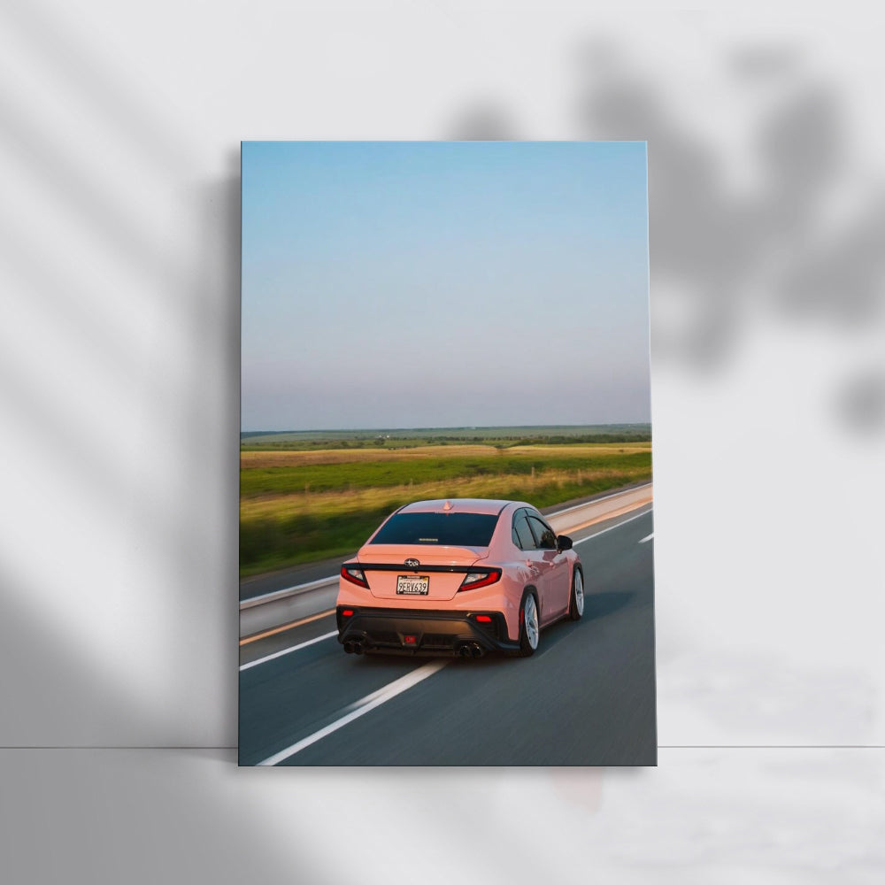 Pink Subaru BRZ Cruising Down Road - Stylish and Bold
