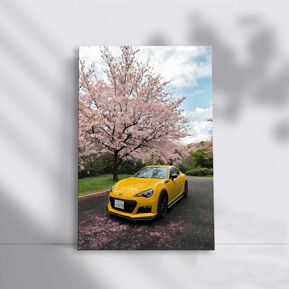 Yellow Subaru BRZ Beneath Cherry Blossoms - Sporty Elegance