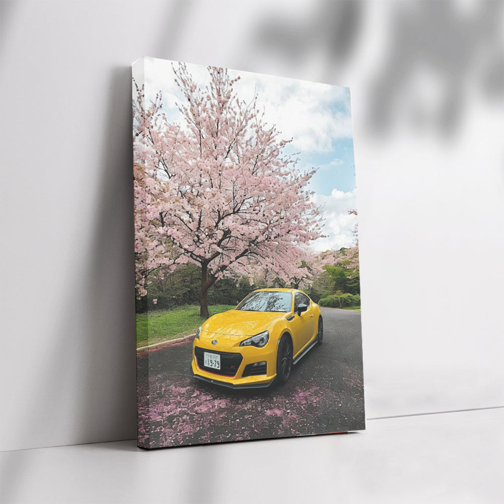 Yellow Subaru BRZ Beneath Cherry Blossoms - Sporty Elegance