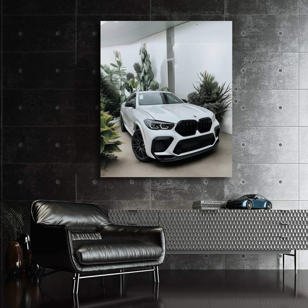Sleek White BMW X6M Amidst Foliage - Power Meets Elegance