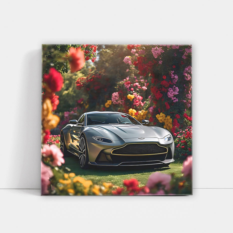 Sleek Gray Aston Martin Vantage Amidst Flowers - Elegance in Motion