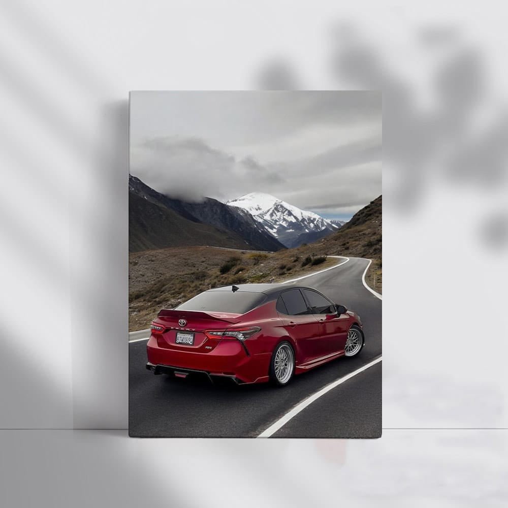 Toyota Camry 70 on Curvy Road, Snowy Peak Backdrop - Reliable Ride - EnjoyStore