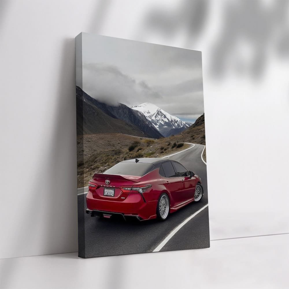 Toyota Camry 70 on Curvy Road, Snowy Peak Backdrop - Reliable Ride - EnjoyStore