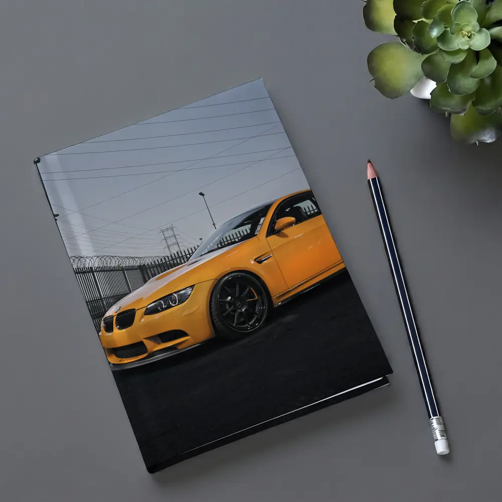 BMW M3 Yellow Coupe Urban Industrial Setting – Notebooks
