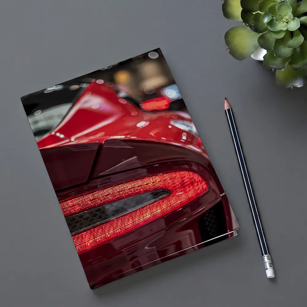 Aston Martin Vanquish Red Tail Light Detail – Notebooks