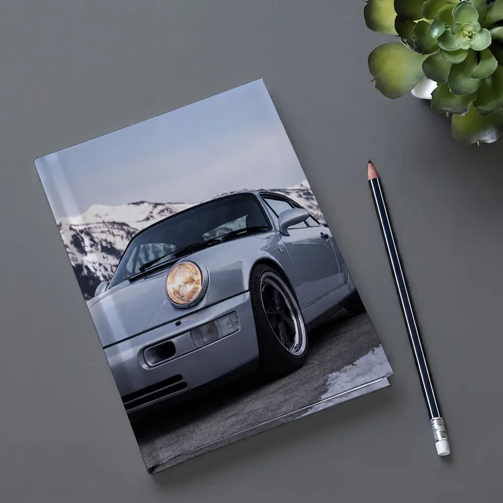Porsche 911 Classic Silver Winter Mountain Scene – Notebooks