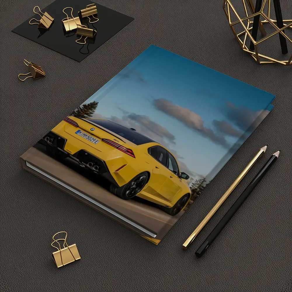 BMW M5 Yellow Sedan On Open Road – Notebooks