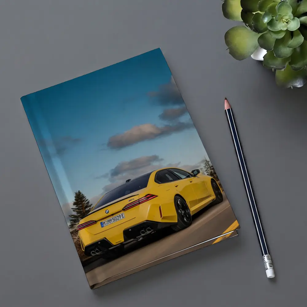 BMW M5 Yellow Sedan On Open Road – Notebooks