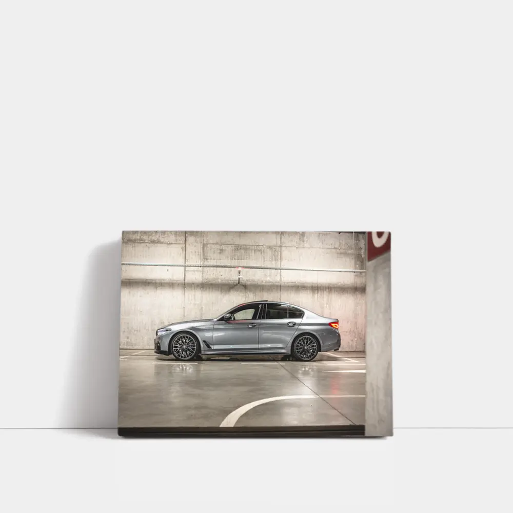 BMW Five Series Parked in Concrete Garage – Wall Art