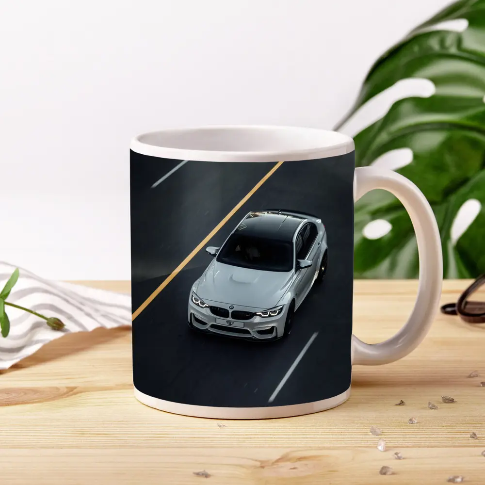 BMW M4 White Sedan on Open Road – Mugs