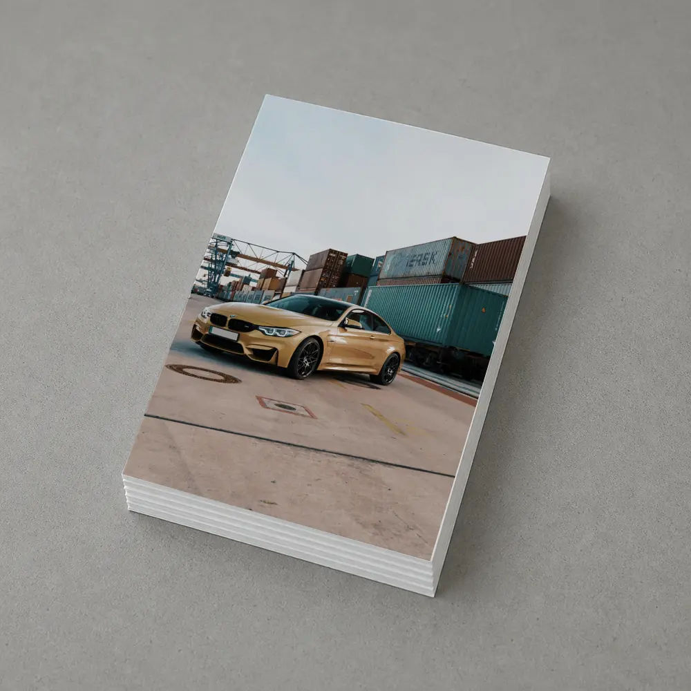 BMW M4 Gold at Industrial Port – Postcards