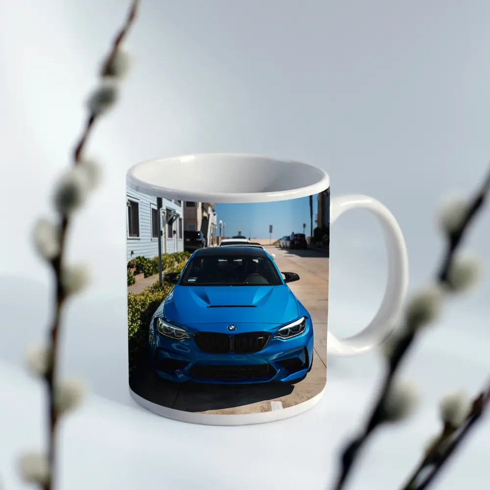 BMW M2 Blue Parked Coastal Street – Mugs