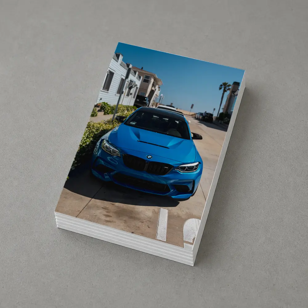 BMW M2 Blue Parked Coastal Street – Postcards
