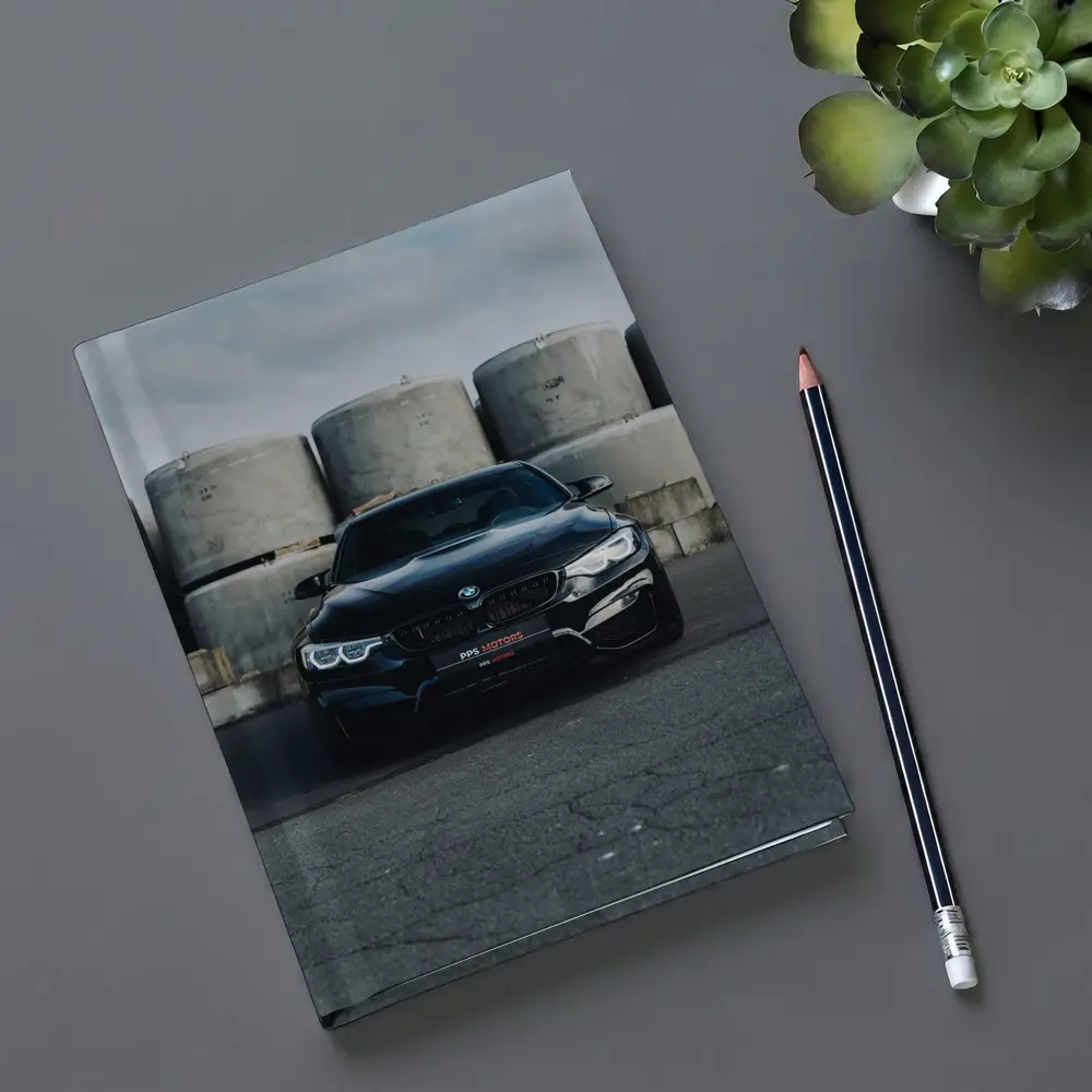 Black BMW M4 Front View Industrial Background – Notebooks