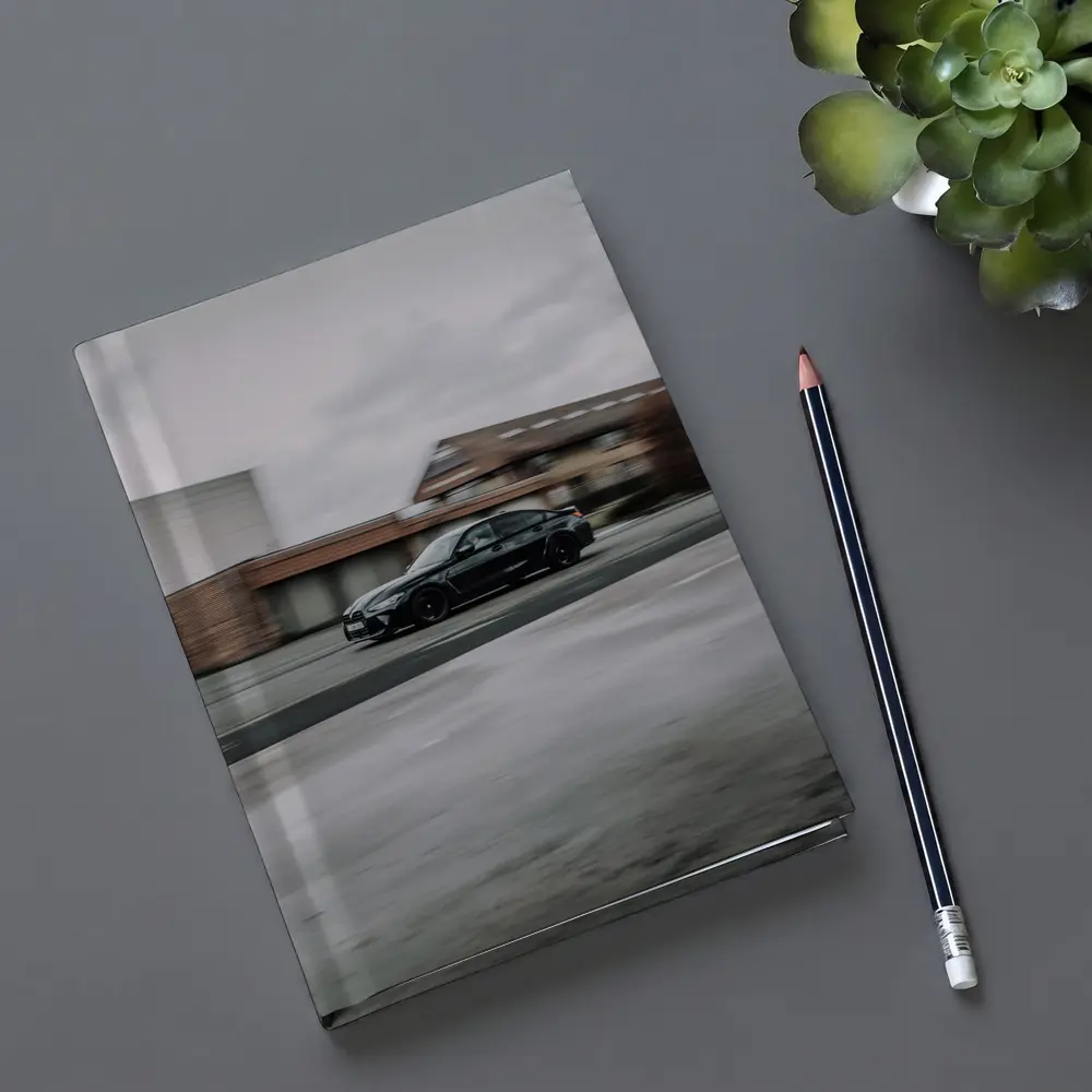 BMW M3 Black Sedan Street Motion Shot – Notebooks