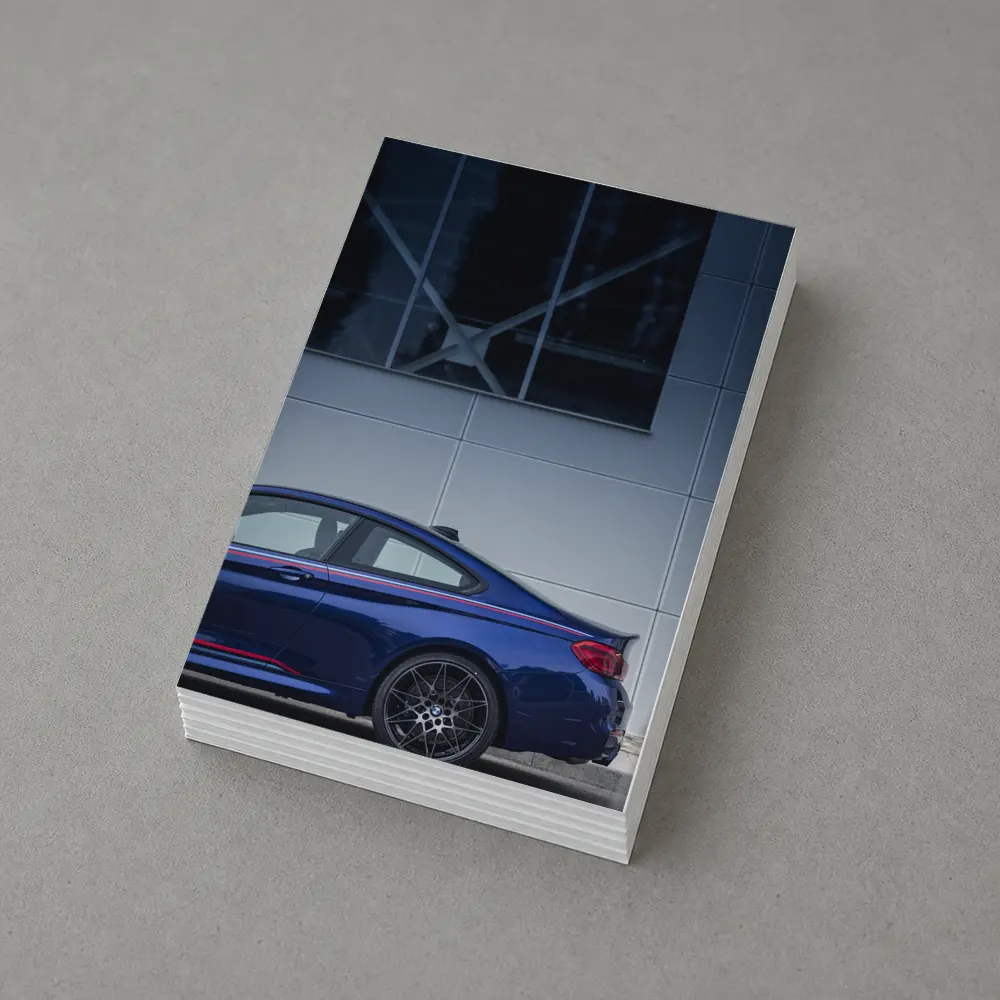 BMW M4 Blue Coupe Against Modern Building – Postcards