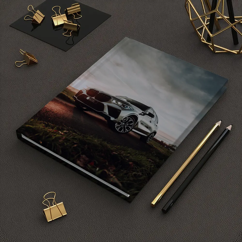 BMW X5M Silver SUV Dramatic Cloudy Sunset – Notebooks