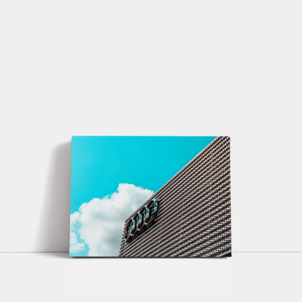 Audi Logo on Building Against Blue Sky – Wall Art
