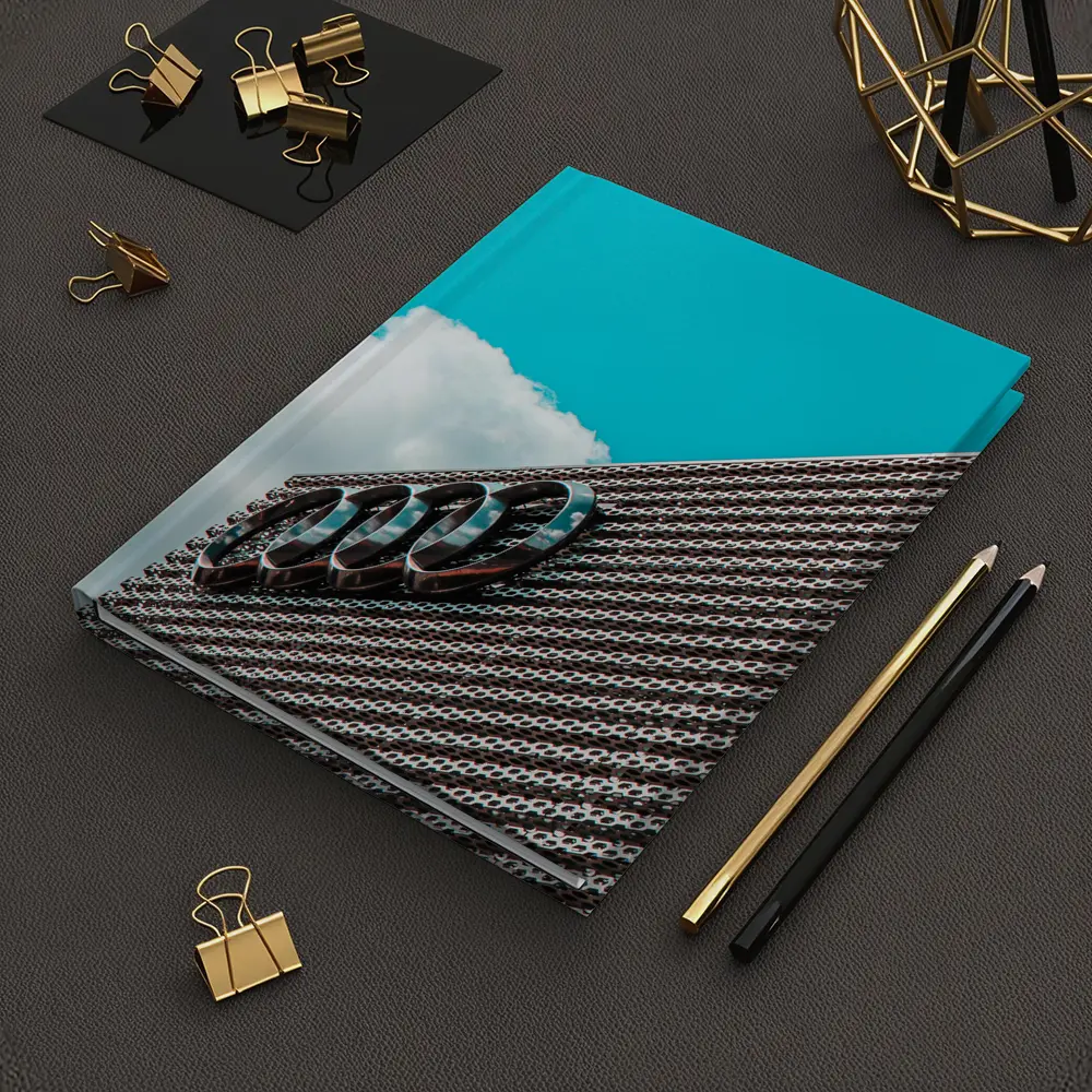 Audi Logo on Building Against Blue Sky – Notebooks