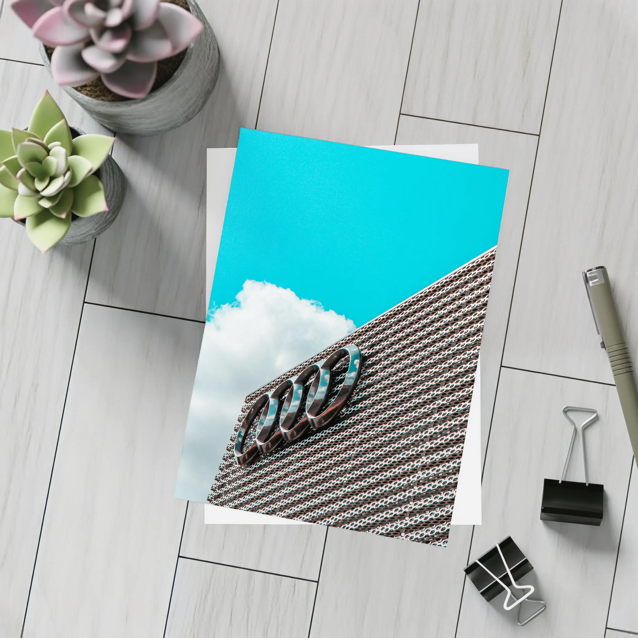 Audi Logo on Building Against Blue Sky – Postcards