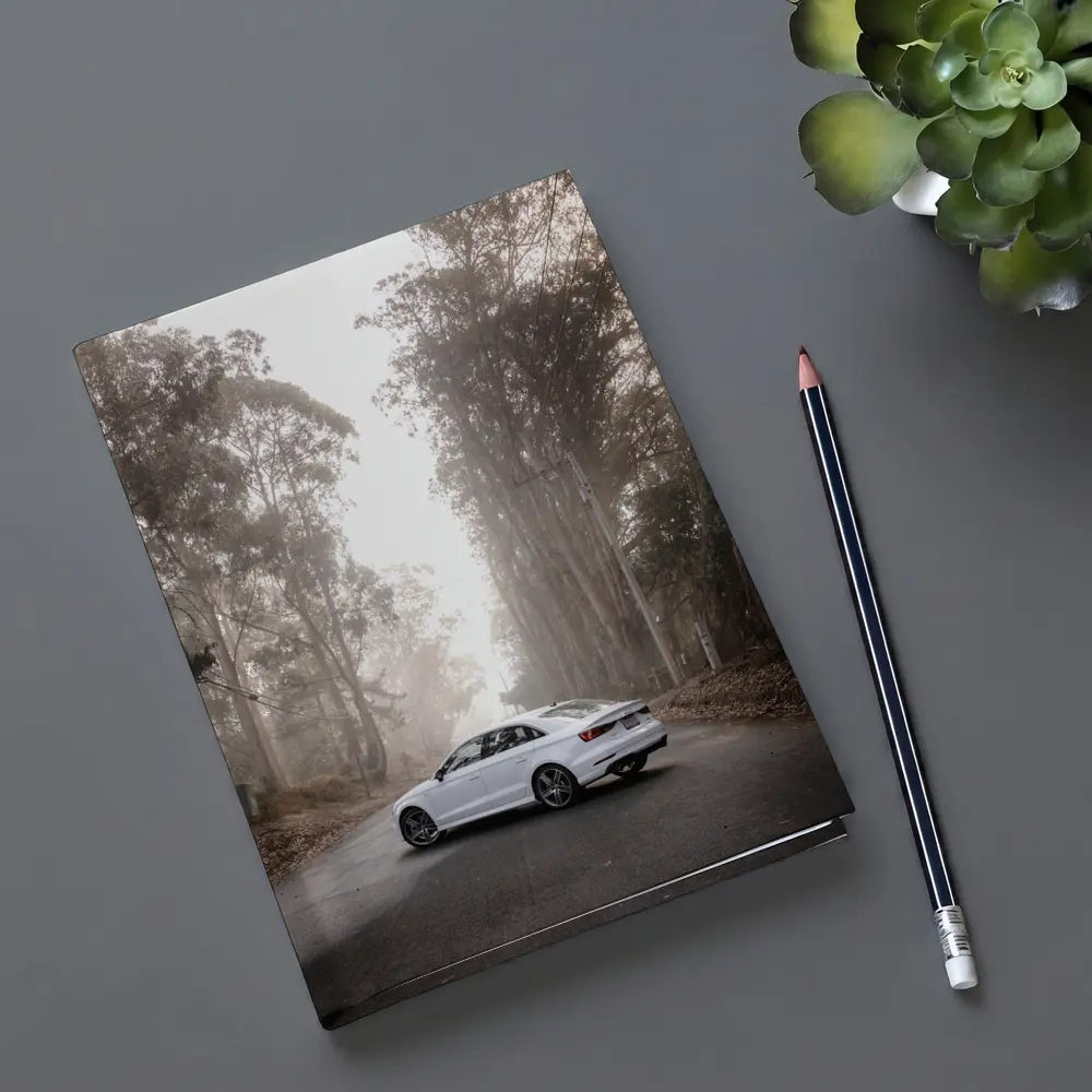 White Audi A3 on Misty Forest Road – Notebooks