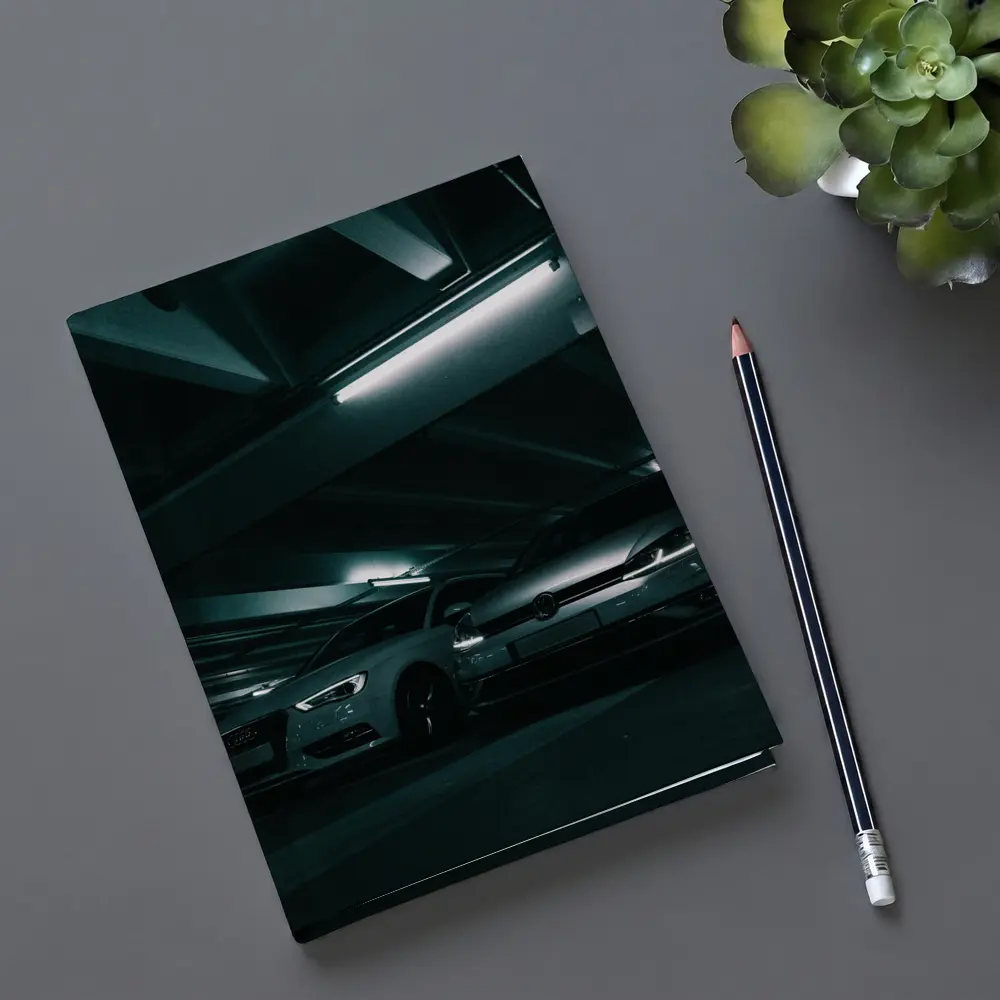 Volkswagen Golf and Audi Dark Parking Garage – Notebooks