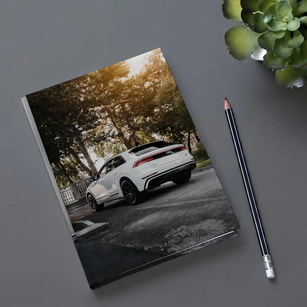 Audi Q8 White SUV Parked Outdoors – Notebooks