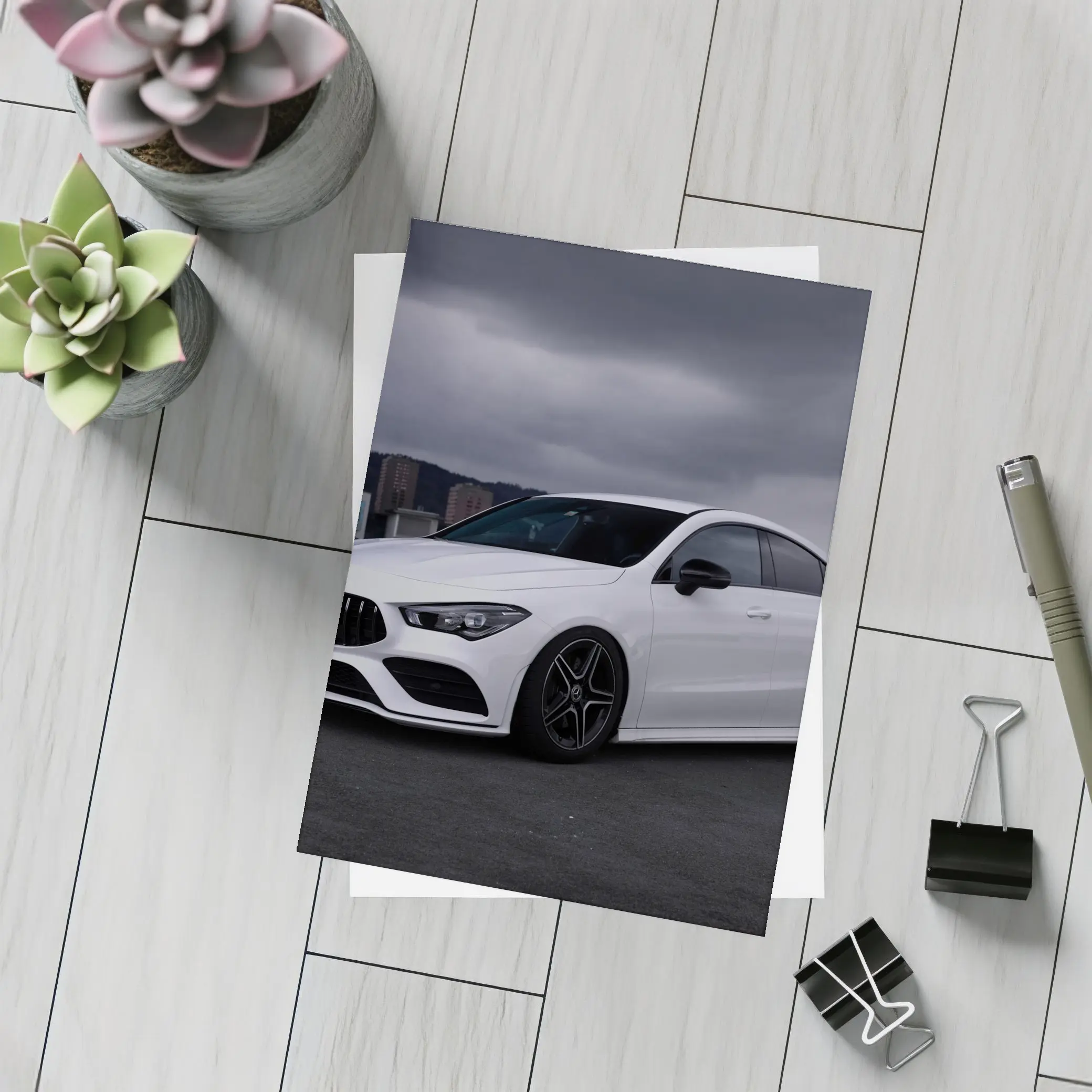 Mercedes CLA White Sedan Stormy City – Postcards