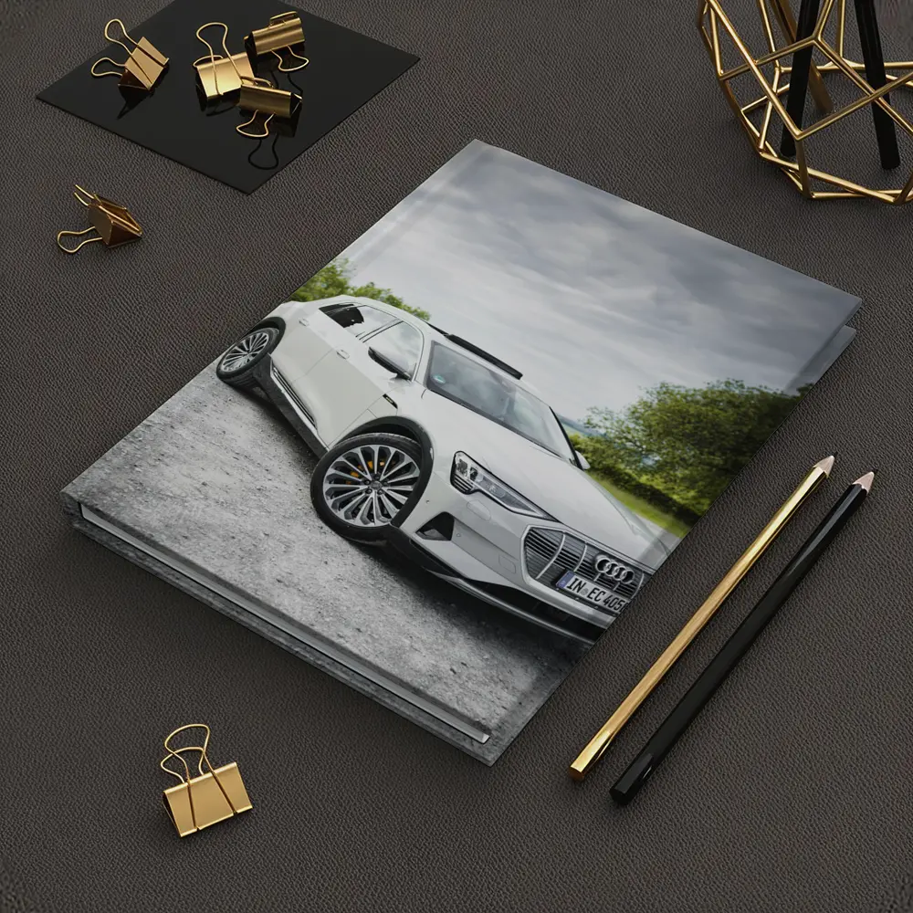 Audi E-Tron White SUV Cloudy Outdoor Setting – Notebooks